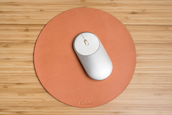 pink/salmon color round mouse pad