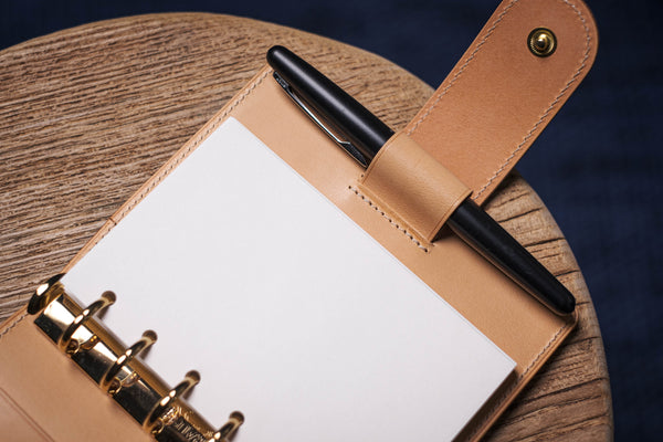 Two-Tone Pocket Black Pebble Leather Ring Organizer with Krause Rings