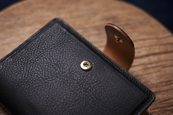 Two-Tone Pocket Black Pebble Leather Ring Organizer with Krause Rings