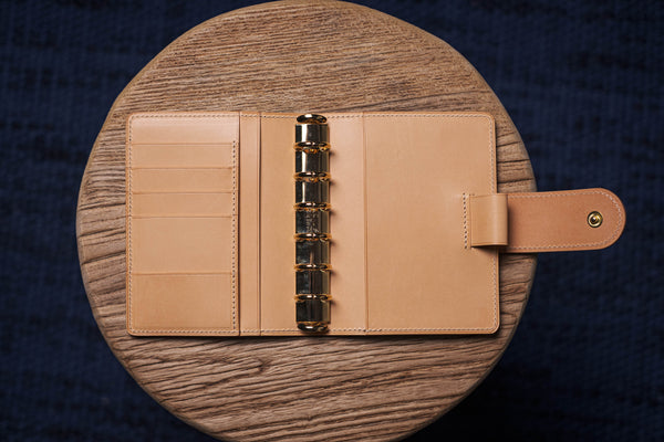 Two-Tone Pocket Black Pebble Leather Ring Organizer with Krause Rings