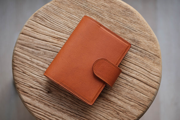 Two-Tone Pocket Black Pebble Leather Ring Organizer with Krause Rings